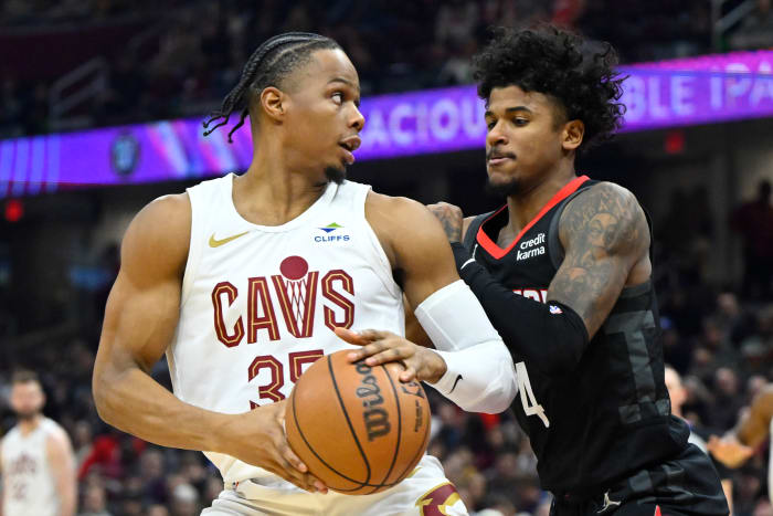 Dec 18, 2023; Cleveland, Ohio, USA; Houston Rockets guard Jalen Green (4) defends Cleveland Cavaliers forward Isaac Okoro (35) in the second quarter at Rocket Mortgage FieldHouse.